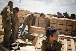 Israeli forces at the Israel-Gaza border. (Ilia Yefimovich via Getty Images)