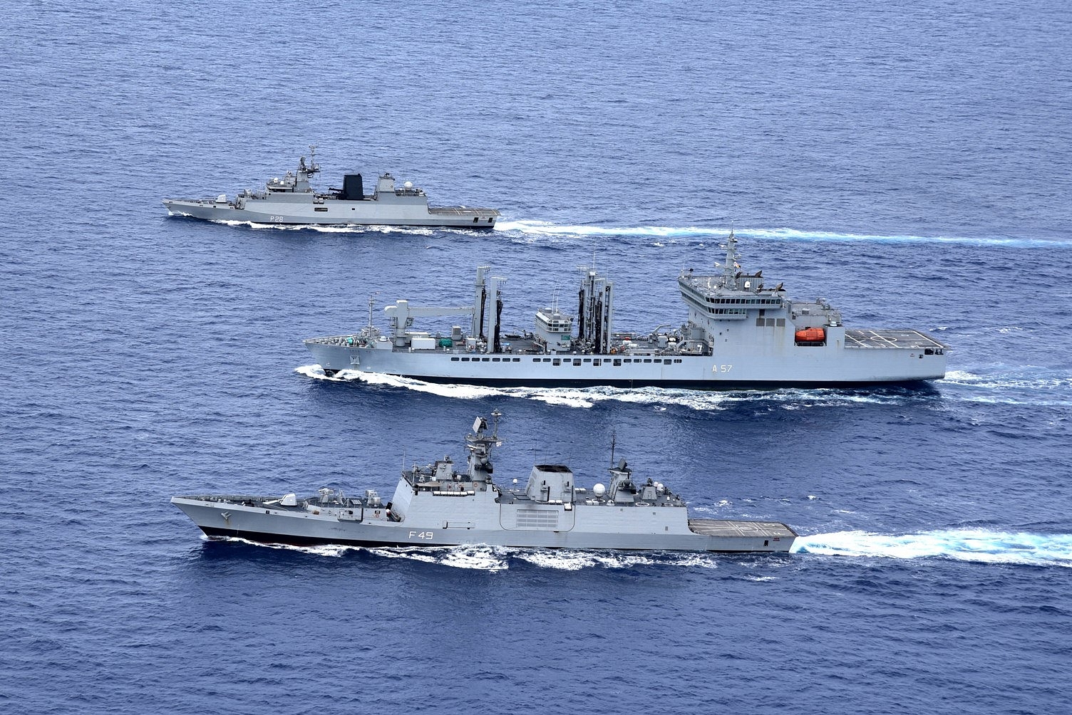 Indigenous stealth frigate INS Sahyadri, anti-submarine stealth corvette INS Kamorta and a fleet tanker. (Livefist/Twitter) 