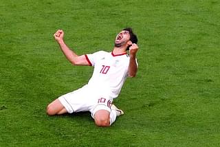 Iran’s Karim Ansarifard is ecstatic as Iran secures a goal against Morocco. (Francois Nel/Getty Images)