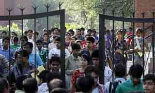 Students walk out of the examination center after appearing for IIT JEE 2012 (Sonu Mehta / Hindustan Times via Getty Images)