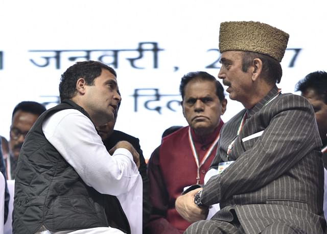 Congress President Rahul Gandhi with party leader Ghulam Nabi Azad. (Arun Sharma/Hindustan Times via Getty Images)