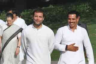 Congress party Vice President Rahul Gandhi with his brother-in-law Robert Vadra while mother Sonia Gandhi follow. (Arvind Yadav/Hindustan Times via Getty Images)