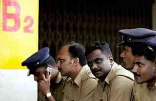 Indian policemen report for duty at the Jawaharlal Nehru Stadium in Kochi. (MANAN VATSYAYANA/AFP/Getty Images)