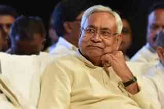 Nitish Kumar is caught between the devil and the deep sea. (Arijit Sen/Hindustan Times via Getty Images)