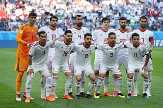 The Iranian team in their Adidas jerseys which they had to buy themselves. (Richard Heathcote/Getty Images)