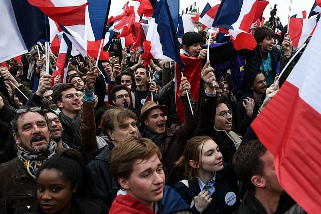 People at a rally in France celebrating Macron’s victory in polls. (David Ramos/Getty Images)