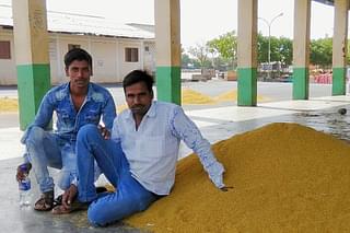 Farmers with their produce at the <i>mandi.&nbsp;</i>