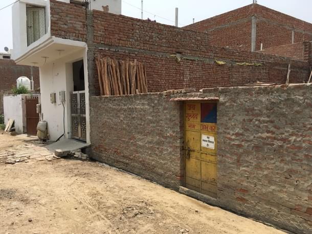 One of the houses with the ‘house on sale’ poster