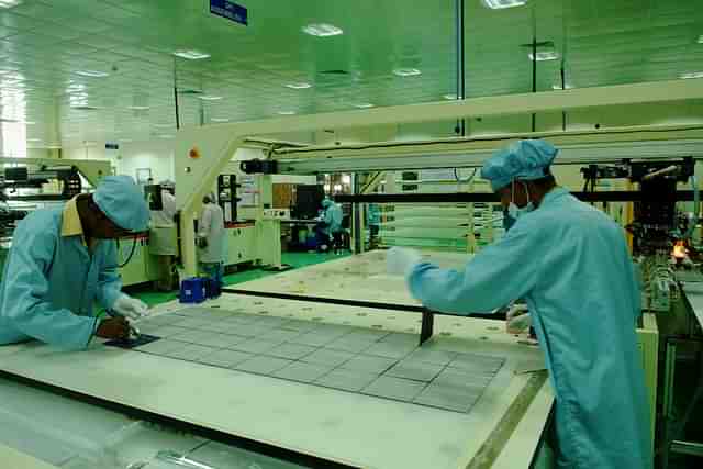A shop floor of solar cells and panels in Bangalore, India. (Hemant Mishra/Mint via GettyImages)