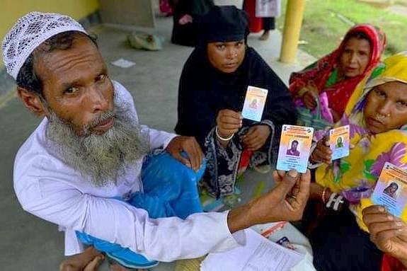 People show their ID cards in Assam (Representative image) (via Twitter)
