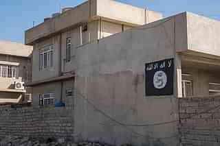 A house in Bartella with the ISIS flag painted on the wall. (Joseph Galanakis/NurPhoto via Getty Images)