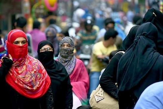 Muslim women are up against a very punishing patriarchy, it appears. (MONEY SHARMA/AFP/Getty Images)