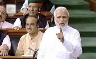 Prime Minister Narendra Modi in the Lok Sabha. (YouTube Screenshot/LokSabhaTV)