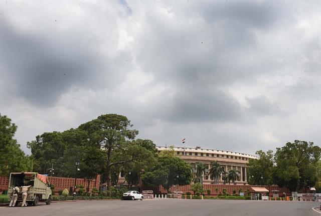 A view of Parliament on a cloudy morning, on 28 June 2018 in New Delhi. (Sonu Mehta/Hindustan Times via Getty Images)
