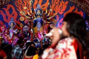 Priests performing rituals in front of  Goddess Durga (Raj K Raj/Hindustan Times via Getty Images)