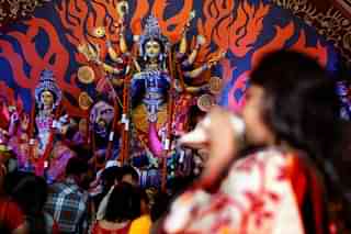 Priests performing rituals in front of  Goddess Durga (Raj K Raj/Hindustan Times via Getty Images)