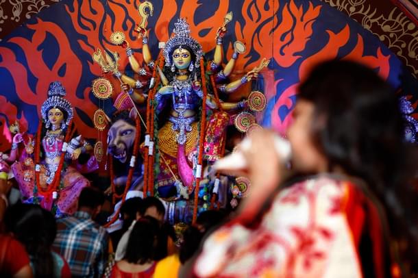 Priests performing rituals in front of  Goddess Durga (Raj K Raj/Hindustan Times via Getty Images)