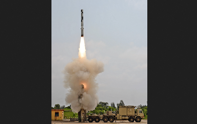                                             BrahMos missile being fired.                      