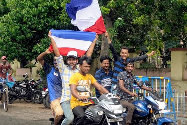 India football fans with the French flag in Bengal. (Samir Jana/Hindustan Times via Getty Images)