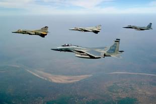 Two USAF F-15 Eagles and two IAF MIG-27 Floggers flying in formation during Cope India 2004. (US Air Force/Wikipedia)