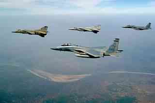 Two USAF F-15 Eagles and two IAF MIG-27 Floggers flying in formation during Cope India 2004. (US Air Force/Wikipedia)