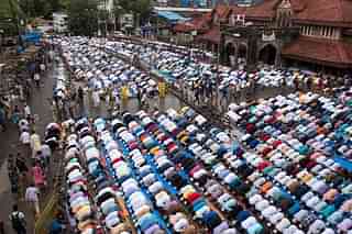 Muslims offering namaz on the road outside Bandra railway station in Mumbai, Maharashtra. (Satish Bate/Hindustan Times via Getty Images)