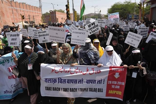 Women led by the women wing of the All India Muslim Personal Law Board take out a silent march in Jaipur to protest against the Triple Talaq bill which they say is anti-Sharia and anti-women. (Prabhakar Sharma\Hindustan Times via GettyImages)