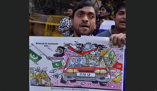 Activists shout slogans against Jawaharlal Nehru University (JNU). (Qamar Sibtain/India Today Group/Getty Images)