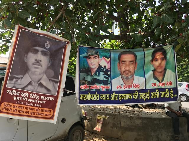 Posters at the site of protest