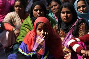 Women taking part in a public meeting organised by women’s groups as part of ‘33 per cent Now’. (Arun Sharma/Hindustan Times via GettyImages) 