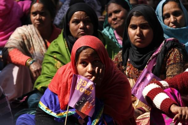 Women taking part in a public meeting organised by women’s groups as part of ‘33 per cent Now’. (Arun Sharma/Hindustan Times via GettyImages) 