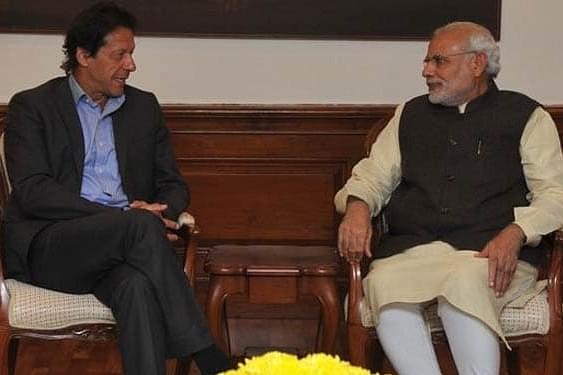 Indian Prime Minister Narendra Modi with Pakistani Prime Minister-elect Imran Khan in 2015 (Ministry of External Affairs/Twitter)