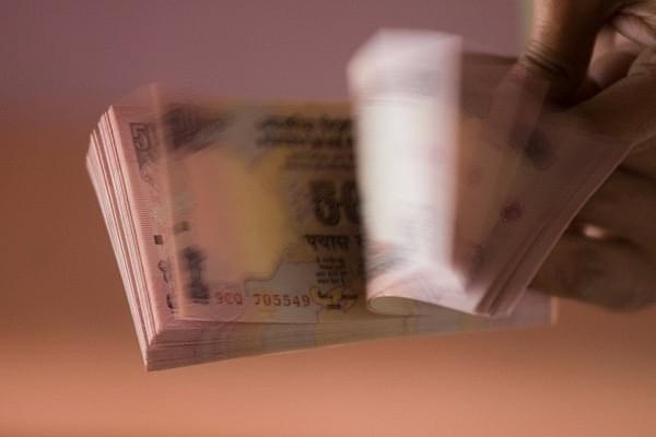 Top managements of major companies are&nbsp;raining cash and free shares on shareholders. (Rajkumar/Mint via Getty Images)