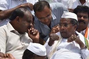 Former Karnataka chief minister Siddaramaiah  with Janata Dal (S) Chief Minister Kumaraswamy during an event in Bengaluru. (Arijit Sen/Hindustan Times via Getty Images)