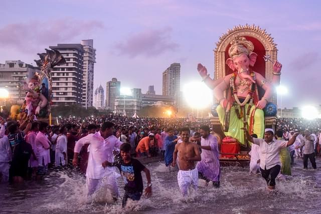 The annual Ganesh visarjan festivities on Anant Chaturdashi in Mumbai (Kunal Patil/Hindustan Times via Getty Images)