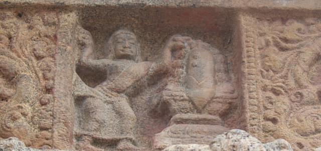 Chakya Nayanar or Buddhist Nayanar throwing stones at the Shiva Lingam. He accepts the stones just like the flowers.&nbsp;