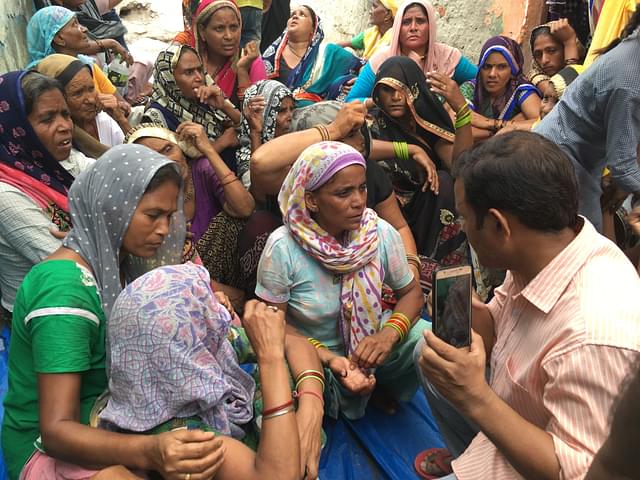 Sanjay’s mother Manju talking to an activist from a Hindu organisation