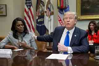 Donald Trump with Omarosa Manigault (Photo by Michael Reynolds - Pool/Getty Images)