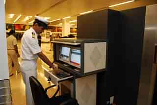Customs officers at the Security scanner at Delhi Airport (Pradeep Gaur/Mint via Getty Images)