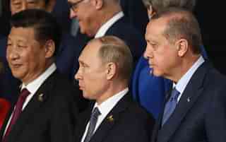 Xi Jinping, Vladimir Putin and Recep Erdogan (left to right). (Matt Cardy/Getty Images)