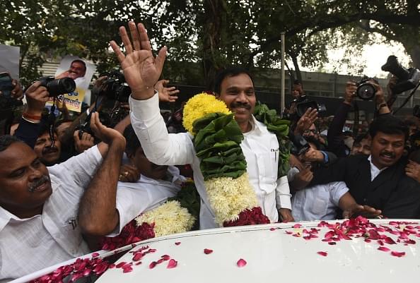 DMK Leader and former Union Telecom Minister A Raja with his supporters celebrating after 2G Case Verdict by Patiala House Court on December 21, 2017 in New Delhi. (Sonu Mehta/Hindustan Times via Getty Images)