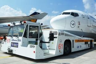 A TaxiBot towing a Lufthansa plane at Frankfurt International Airport 