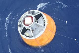 Crew module floating in the Andaman Sea after a splashdown following the test launch. 