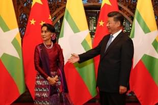 Myanmar State Counsellor Aung San Suu Kyi and Chinese President Xi Jinping. (ROLEX DELA PENA/AFP/Getty Images)