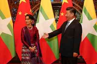Myanmar State Counsellor Aung San Suu Kyi and Chinese President Xi Jinping. (ROLEX DELA PENA/AFP/Getty Images)