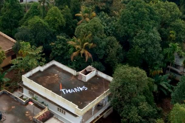 A thank you note painted on the roof of a house where the Naval Advanced Light Helicopter piloted by Vijay Varma rescued two women. (SpokespersonNavy/Twitter)