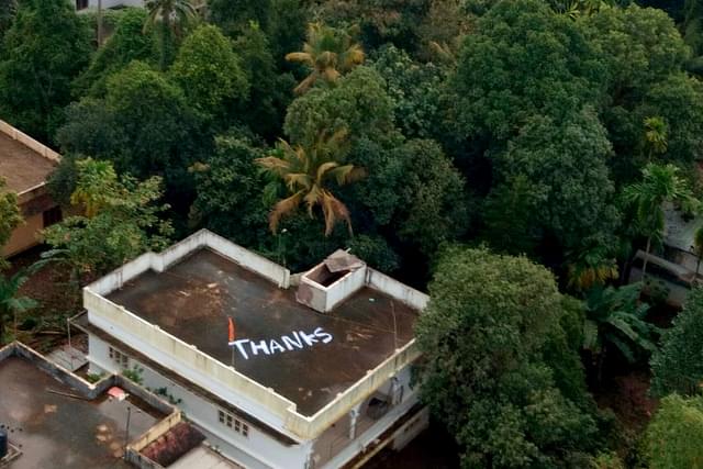 A thank you note painted on the roof of a house where the Naval Advanced Light Helicopter piloted by Vijay Varma rescued two women. (SpokespersonNavy/Twitter)