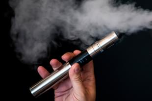Vape Lab employee Leonardo Verzaro uses an E-Cigarette. (Dan Kitwood/Getty Images) 