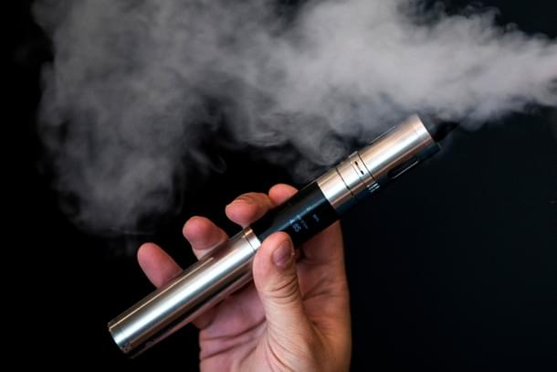 Vape Lab employee Leonardo Verzaro uses an E-Cigarette. (Dan Kitwood/Getty Images) 
