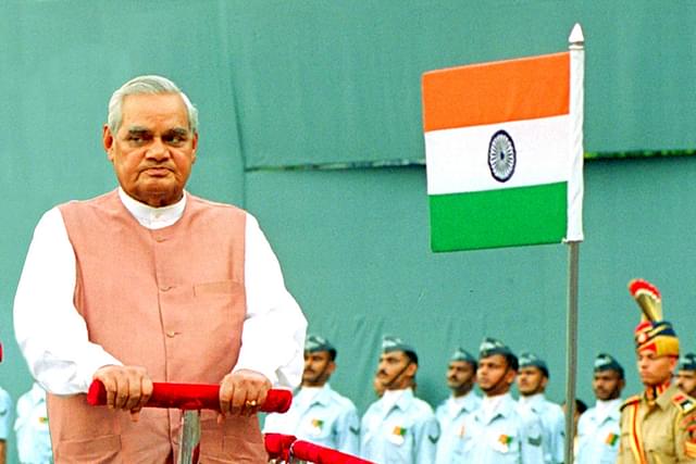 Former Prime Minister Atal Bihari Vajpayee inspects the guard of honor before his address to the nation on Independence day in 2002. (Ajay Aggarwal/Hindustan Times via Getty Images)